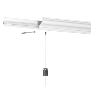 Artiteq Deco Rail concealed picture hanging system installed behind a cornice