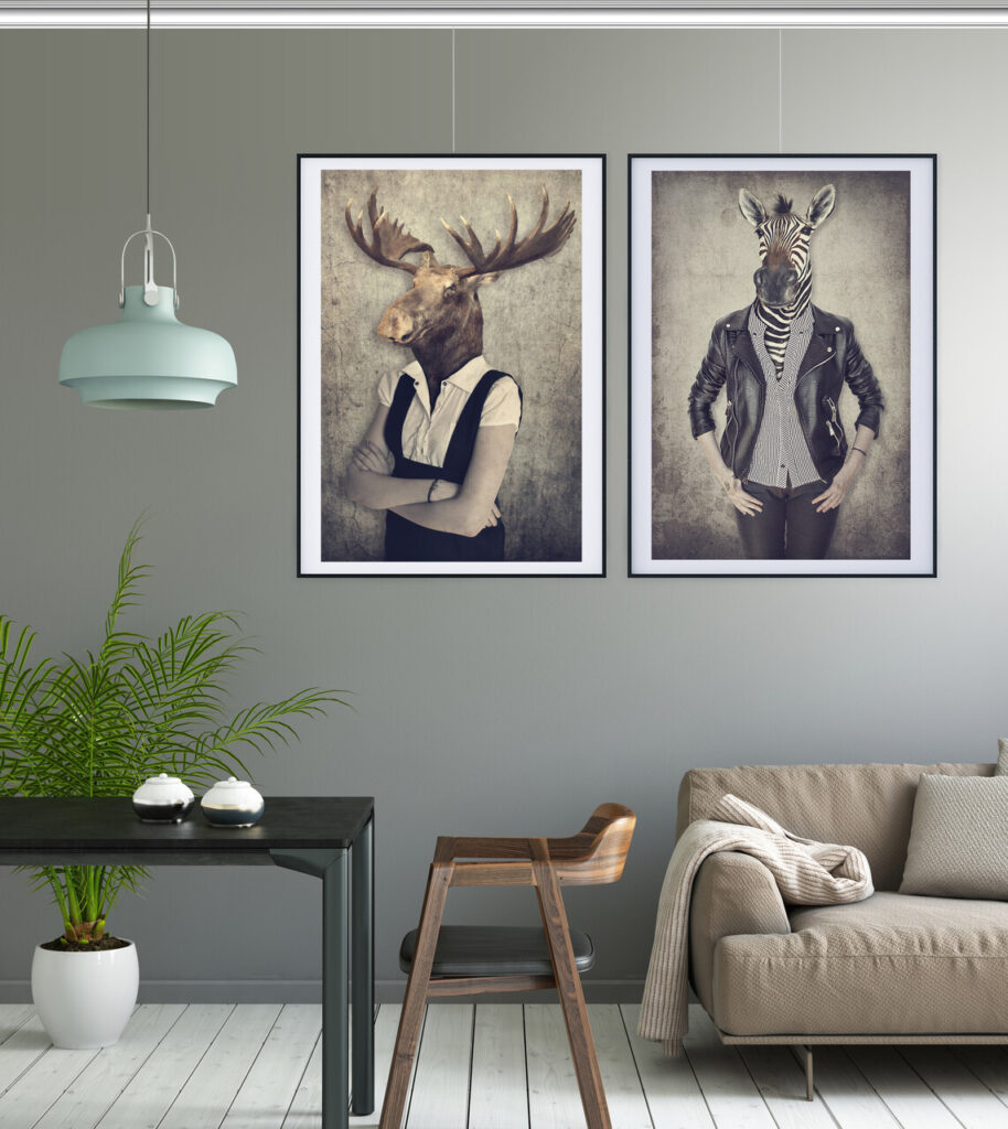 Picture hanging rail displaying framed artwork on a wall