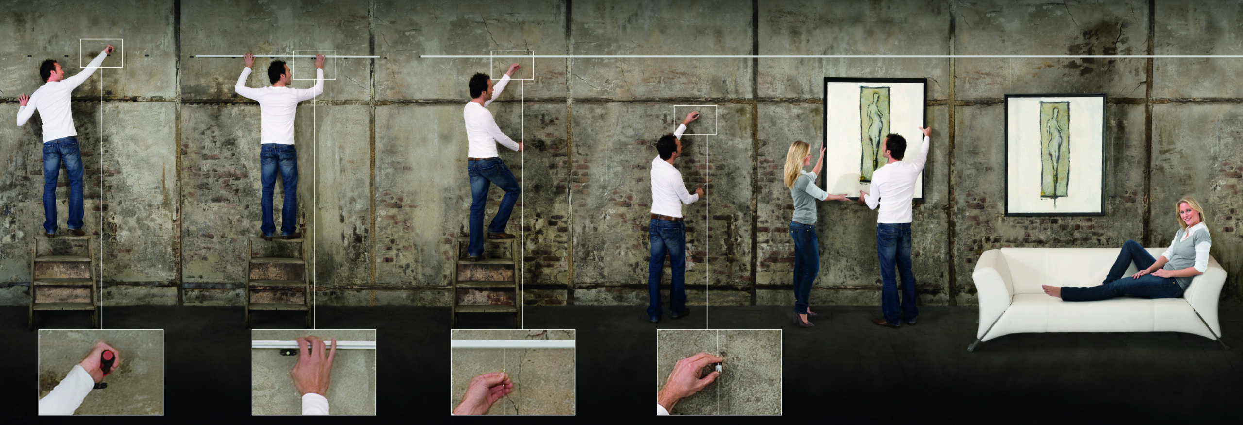 People installing a picture hanging system to display artwork on a wall
